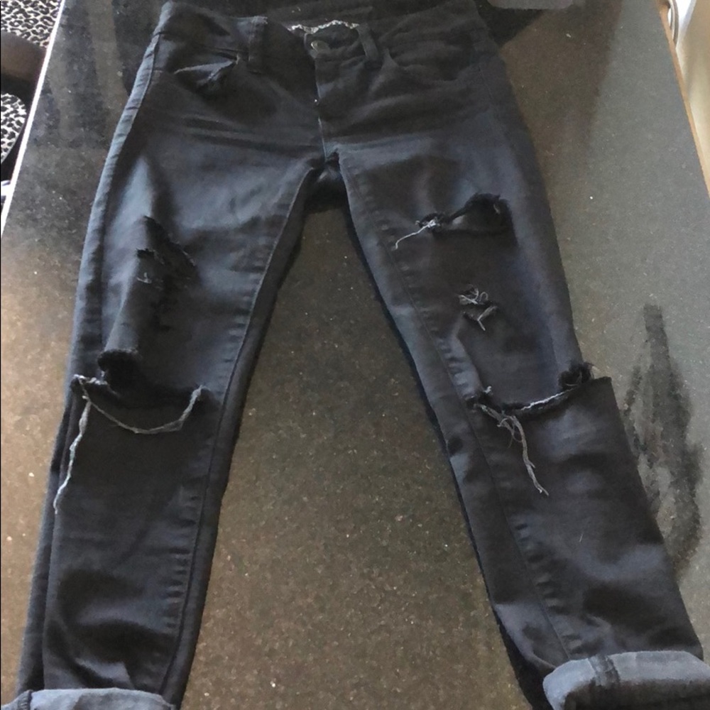 Black Distressed and ripped skinny jeans